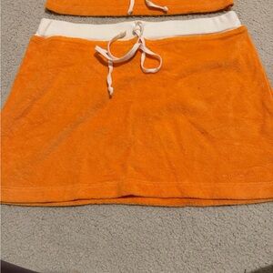 Bebe Vibrant Orange an white mini Skirt and matching tube top worn few times
